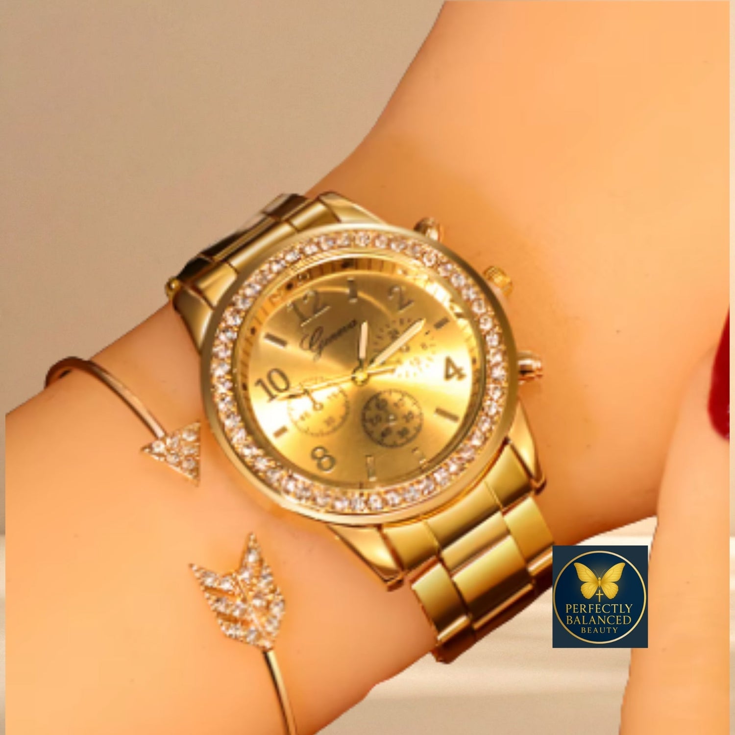 Elegant gold women’s watch with crystal accents and matching faith-inspired bracelets on a warm beige background – symbolizing divine timing and timeless elegance from Perfectly Balanced Beauty