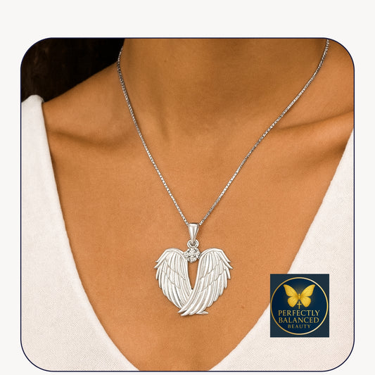 “Faith’s Flight” — 925 Sterling Silver Angel Wings Heart Necklace
